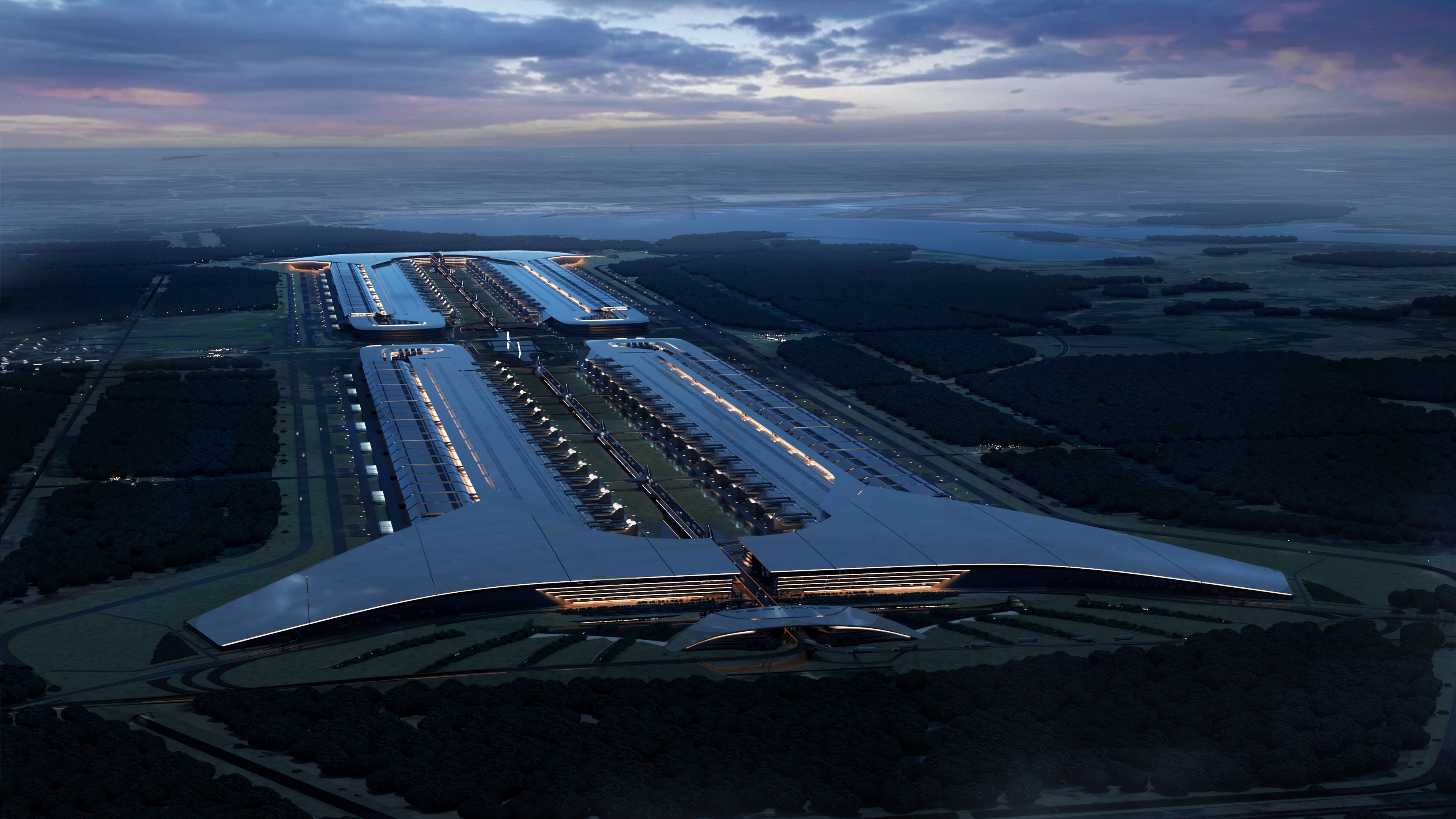Aerial concept render of the Tesla Terafab campus at dusk